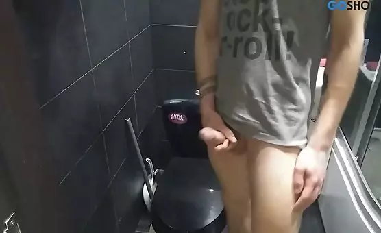 Eyeglasses Wearing Man Gets Wild HandJob in Restroom